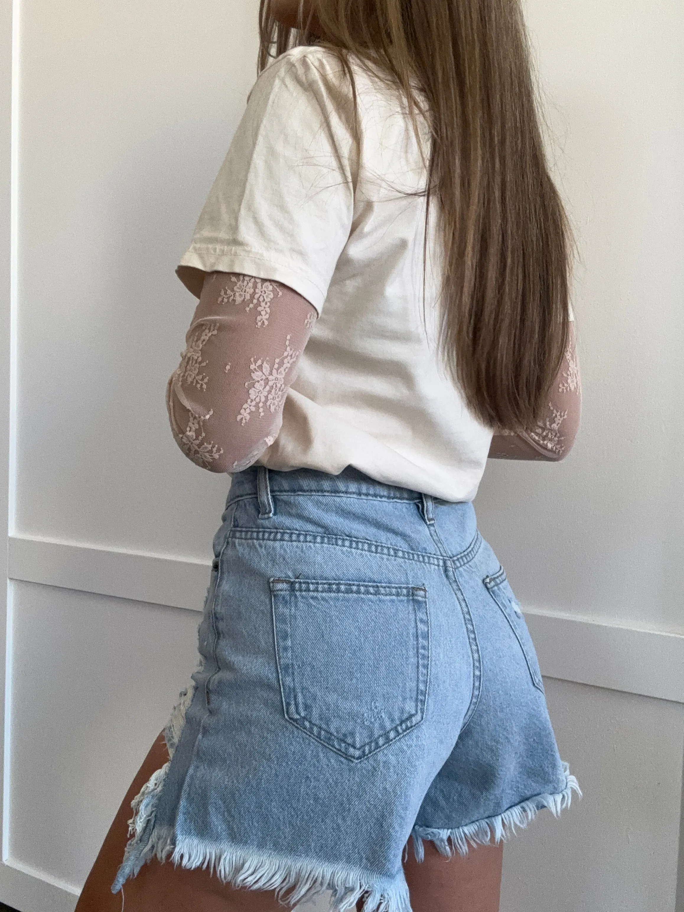Naomi High Waisted Fringed Hem Shorts